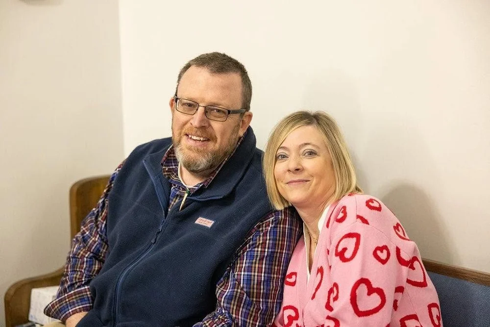 A couple smiling together