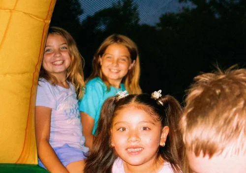Girls smiling at last year’s fall festival