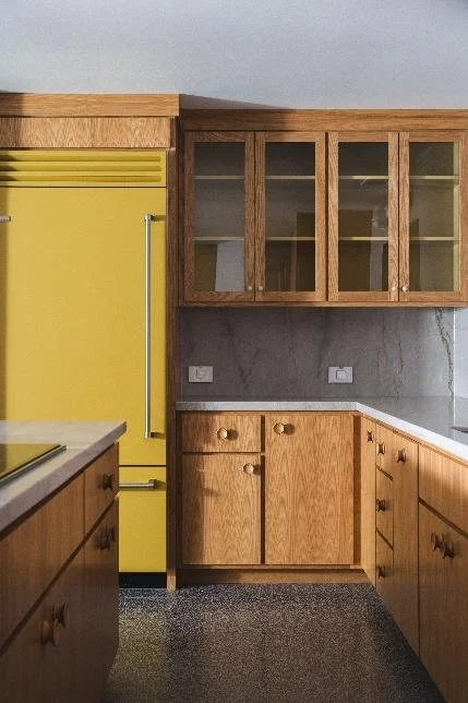 Mid-century modern kitchen with warm wood cabinetry