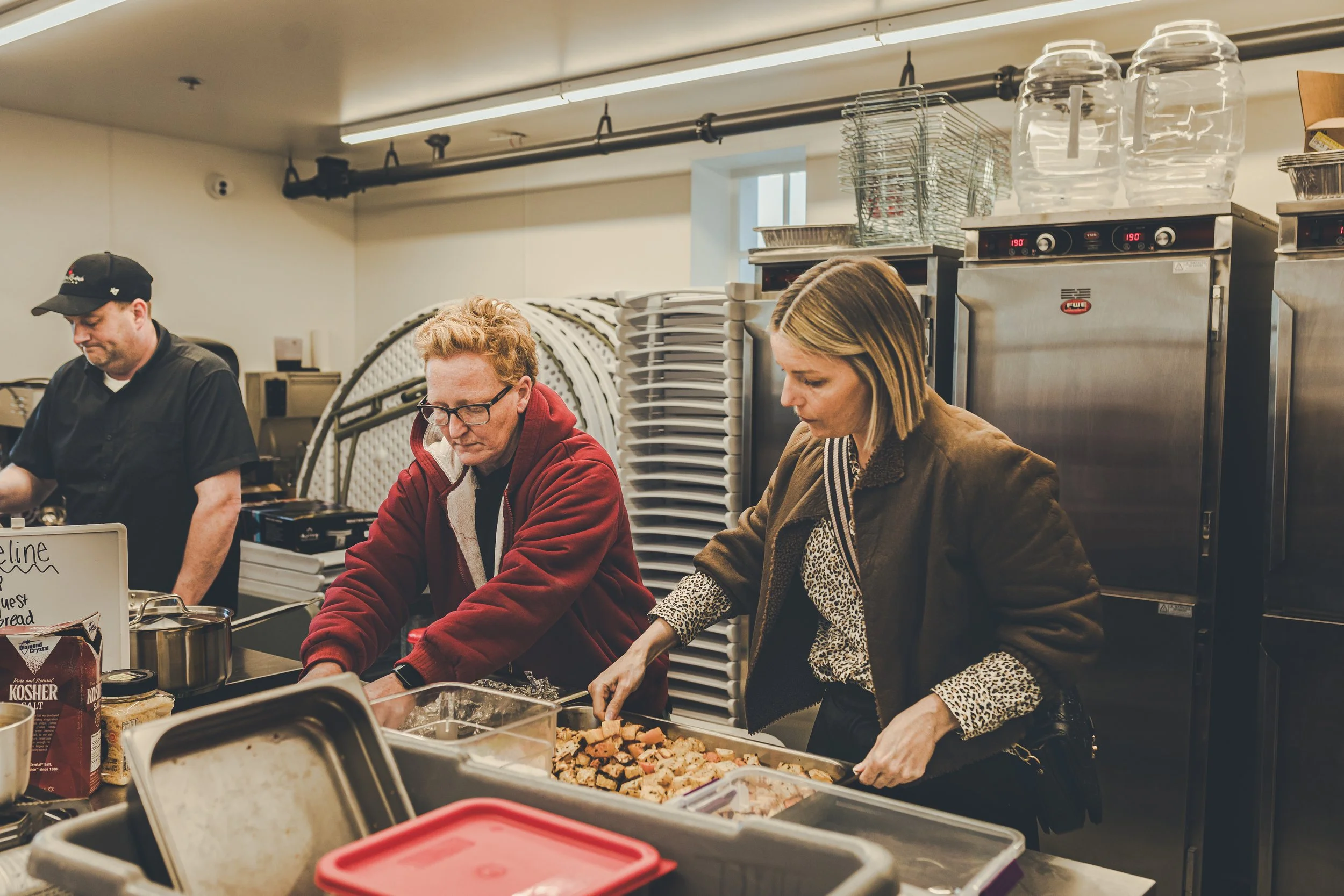 Beau Williams and Damaris Phillips preparing food together