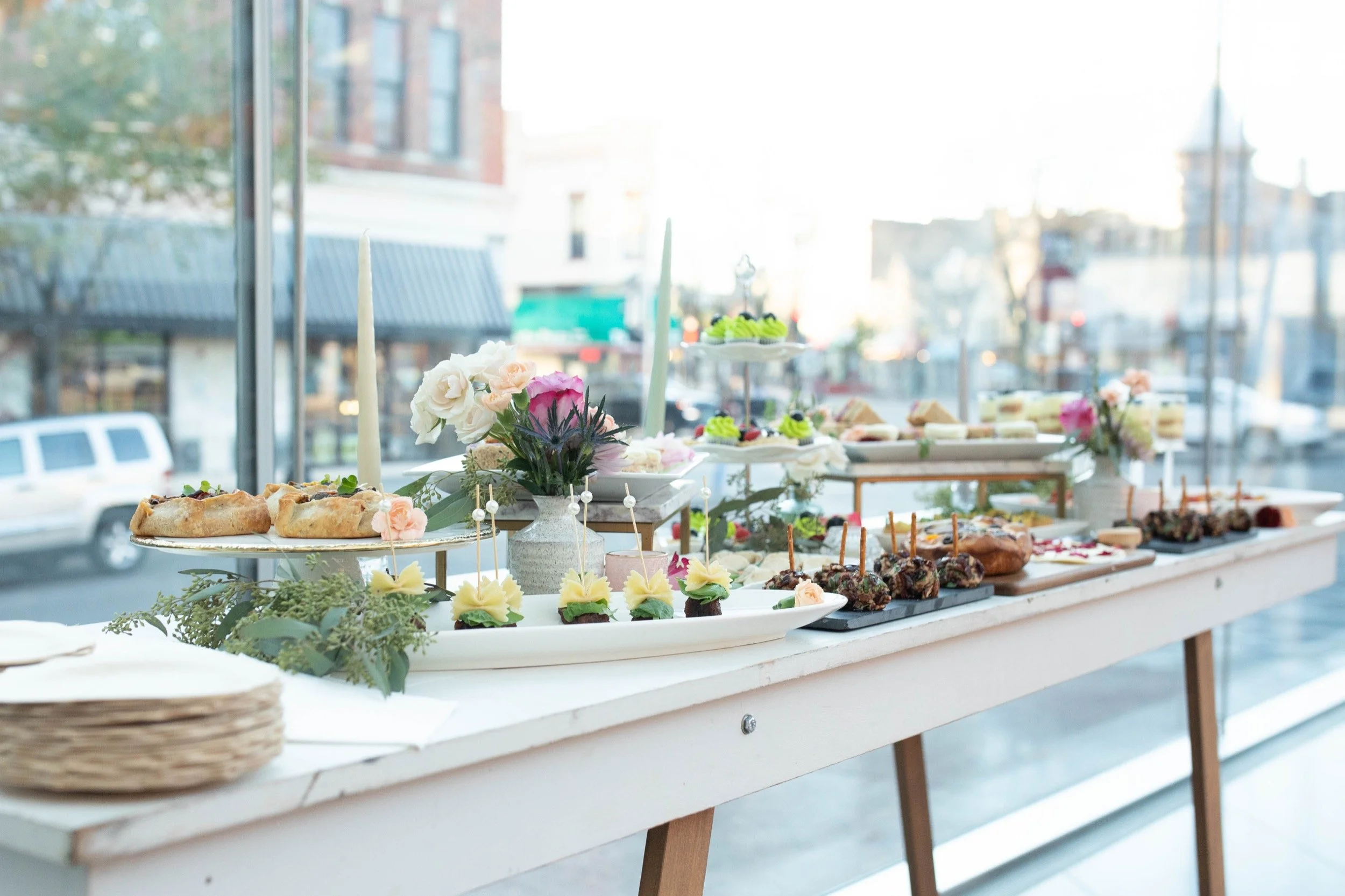 A bright, flower-filled table of composed food