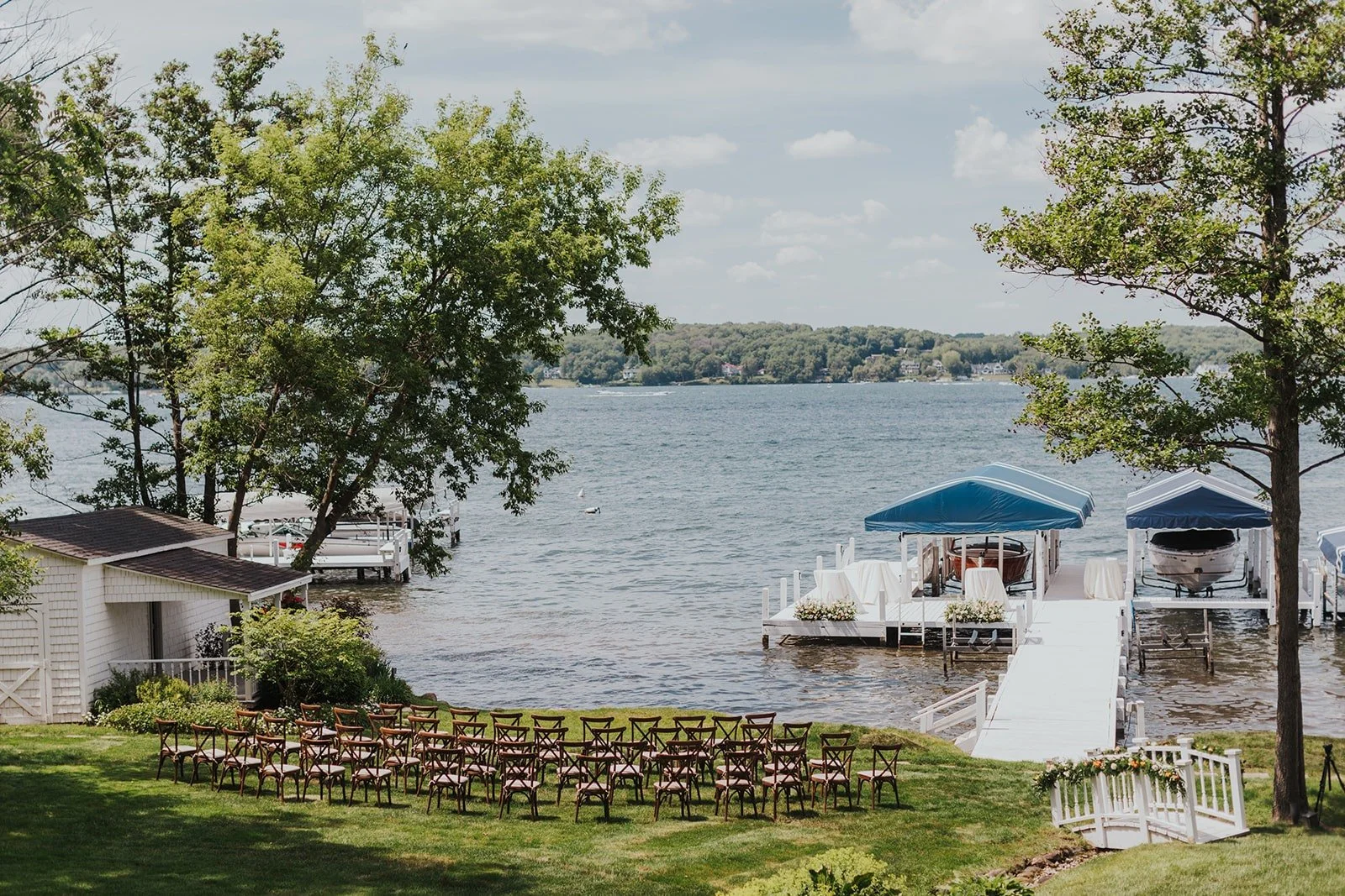 Lakeside ceremony seating, supplied by Blue Fancy Events