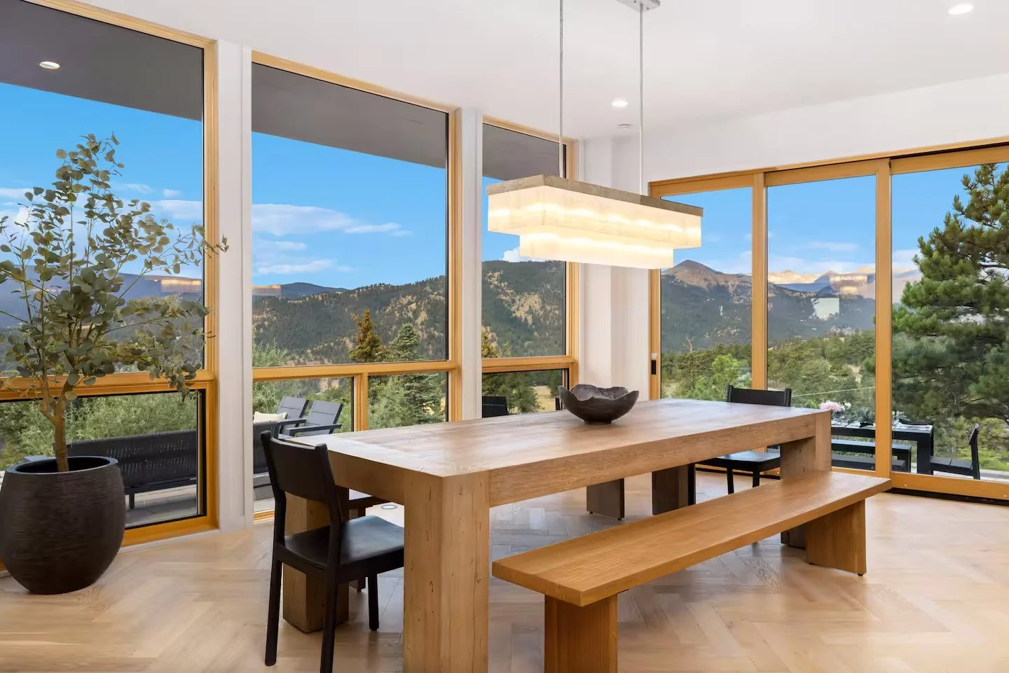 Boulder dining room with expansive mountain views and timber window frames