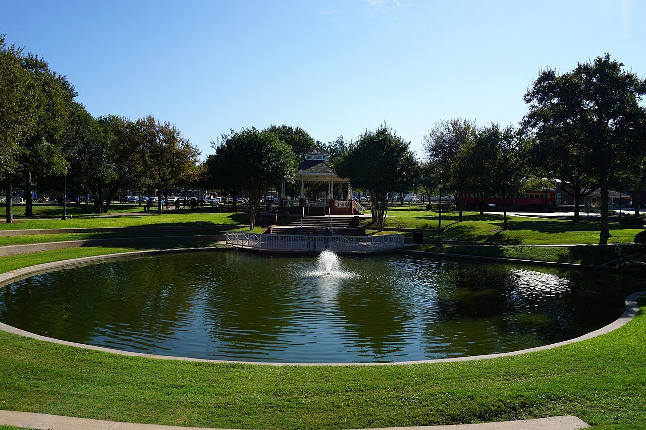 The pond, fountain, and gazebo at Haggard Park in Plano