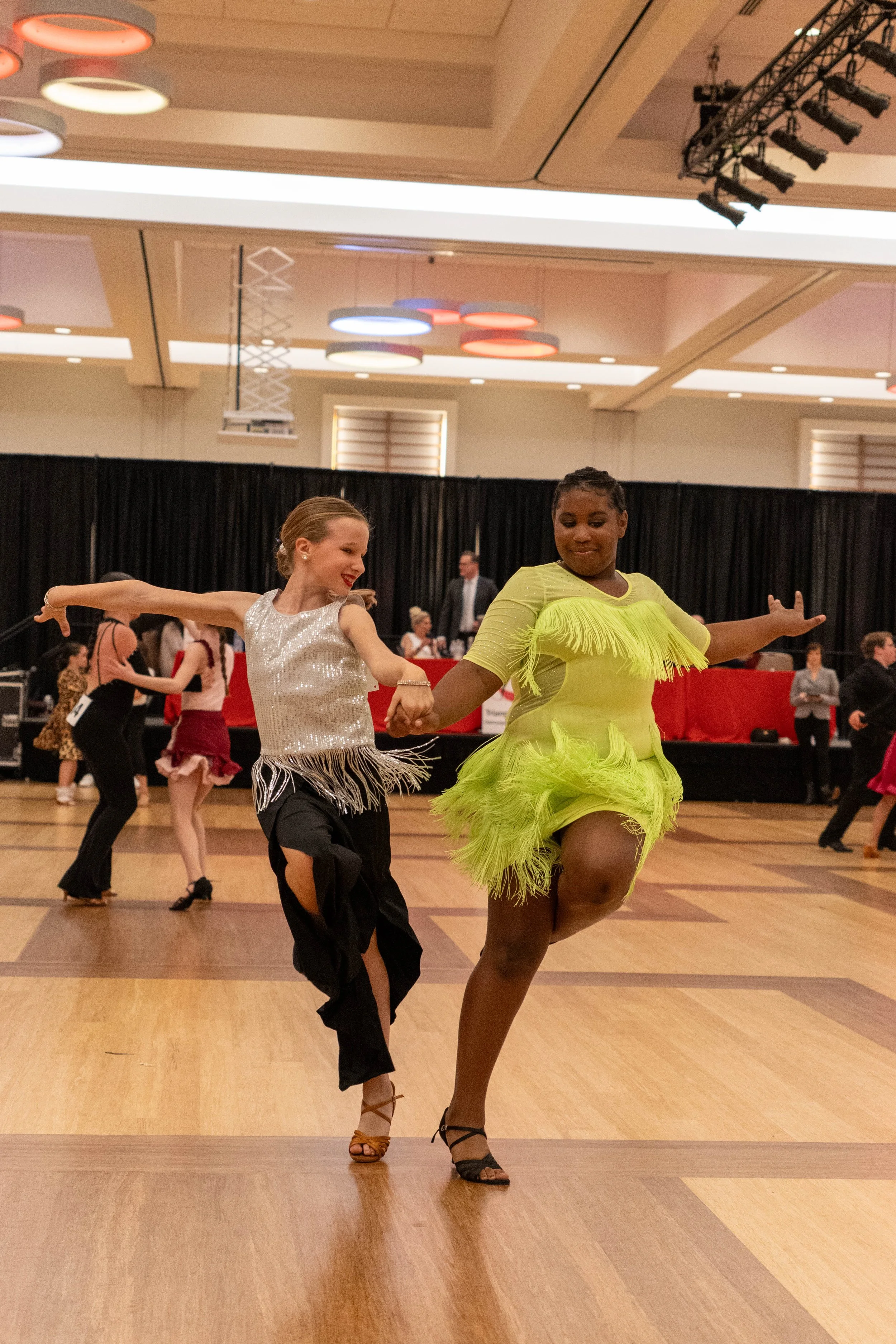 Two girls dancing together