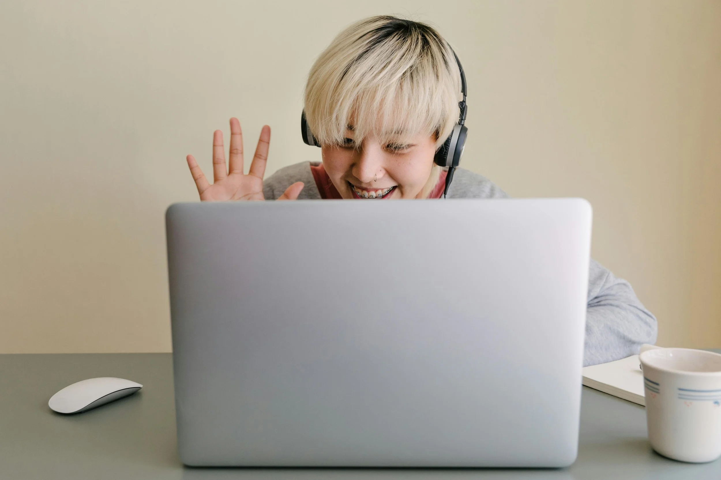 Child engaging in telehealth therapy session