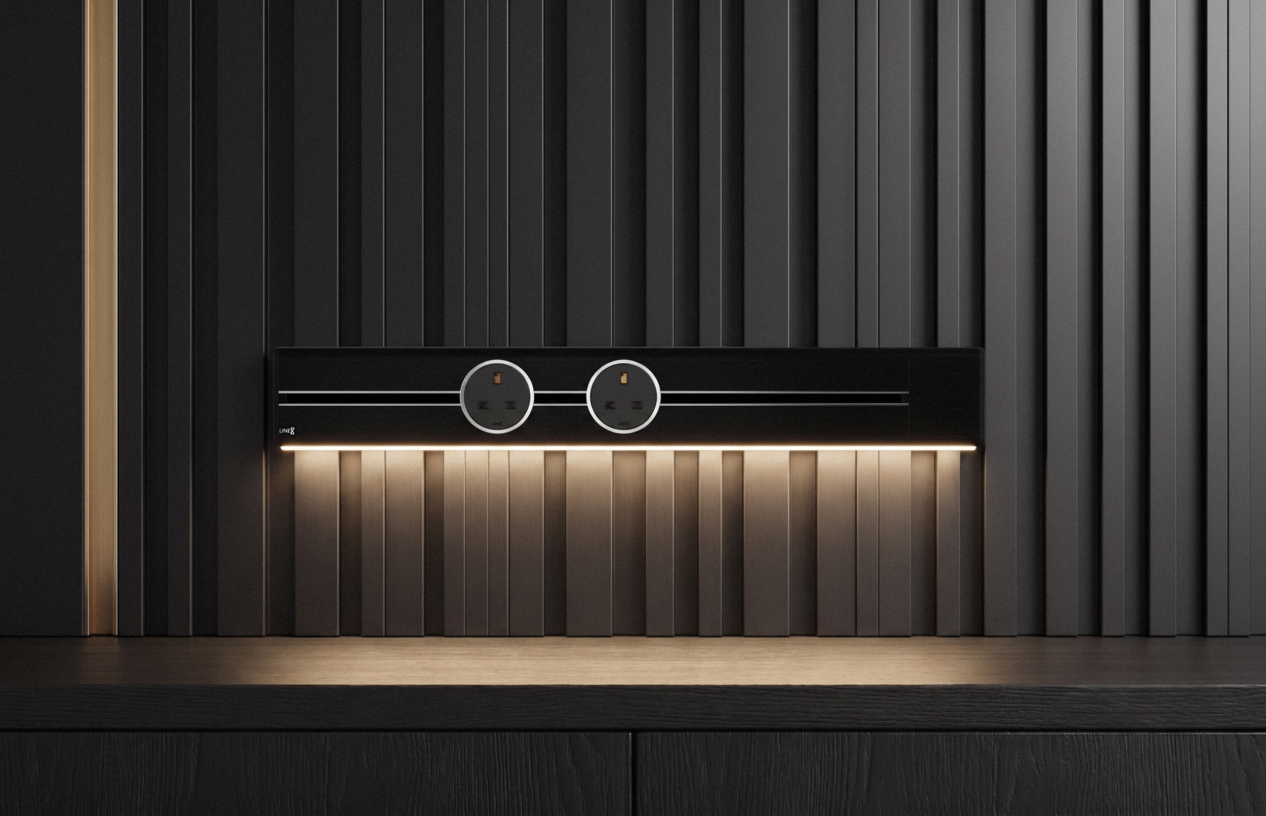 Premium Line8 Model SL-w electrical power track showcasing a Black Hairline finish and integrated ambient lighting. Mounted against a sophisticated black slatted wall panel, the high-end architectural fitting includes two circular power adaptors illuminating a dark wood countertop.