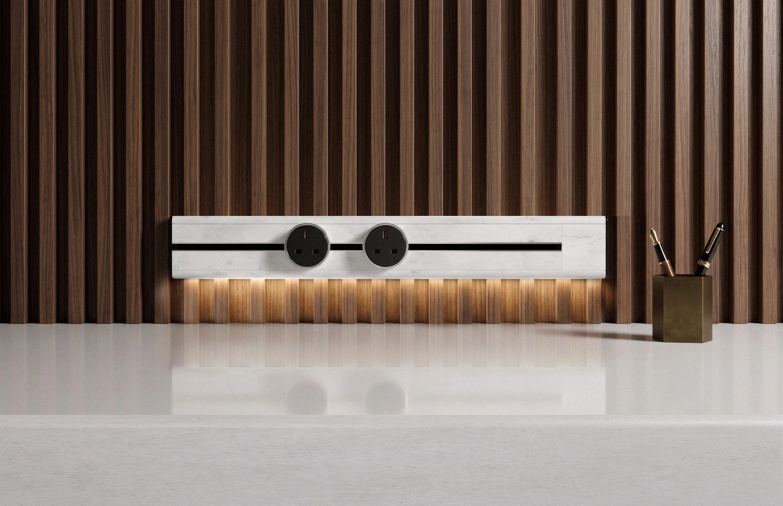 Premium Line8 Model SL-w electrical power track showcasing a luxurious Indian White Marble Finish and integrated ambient under-lighting. Mounted against a sophisticated dark wood slatted accent wall panel, the high-end architectural fitting includes two circular black power adaptors and illuminates a clean white counter surface.