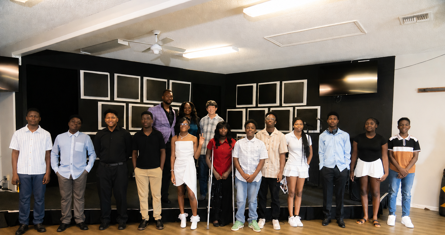 Hero photo: diverse youth in a classroom or professional setting