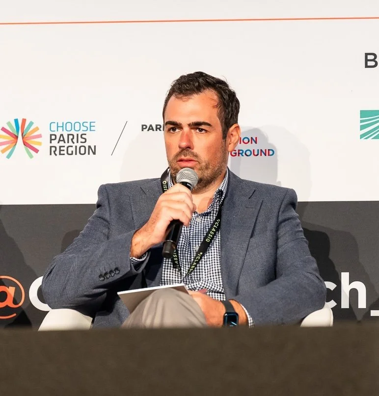 Dr Philip Intallura on a panel at a quantum technology summit in Paris