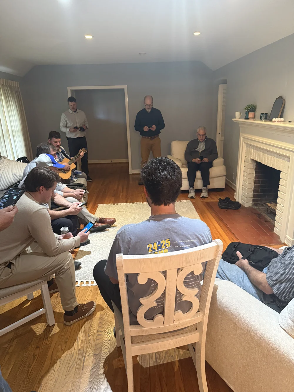 A Bible study gathered in a home.