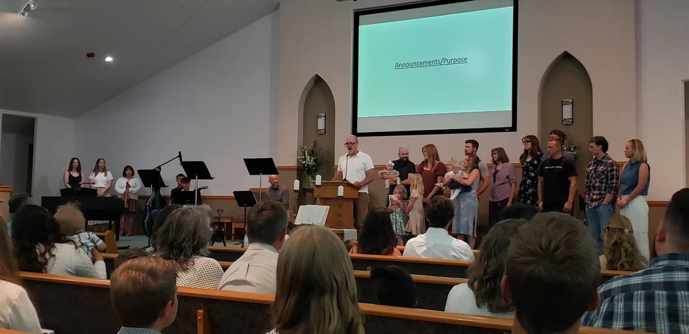 Children singing together at PBC.
