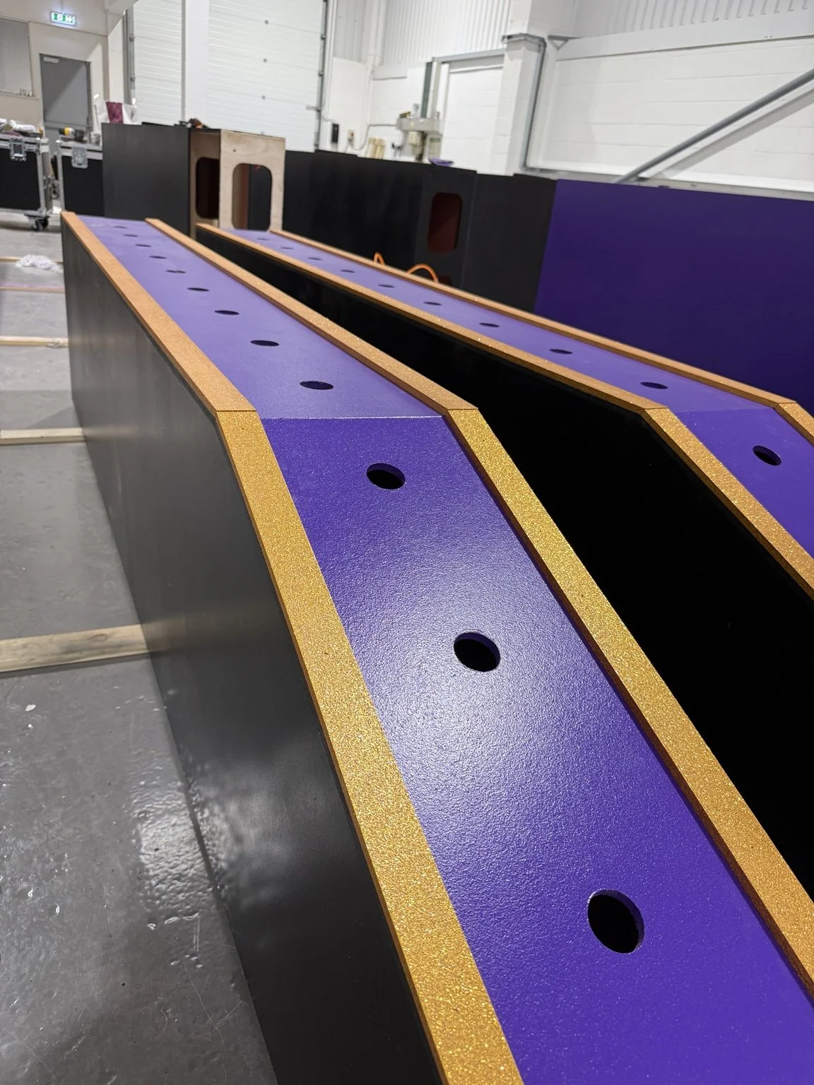 Purple and gold scenic finish