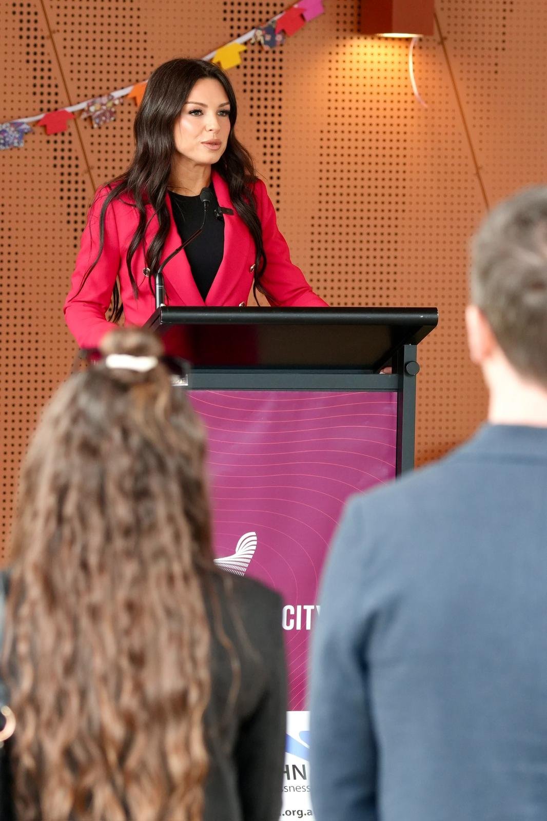 Jess participating in a speaking event