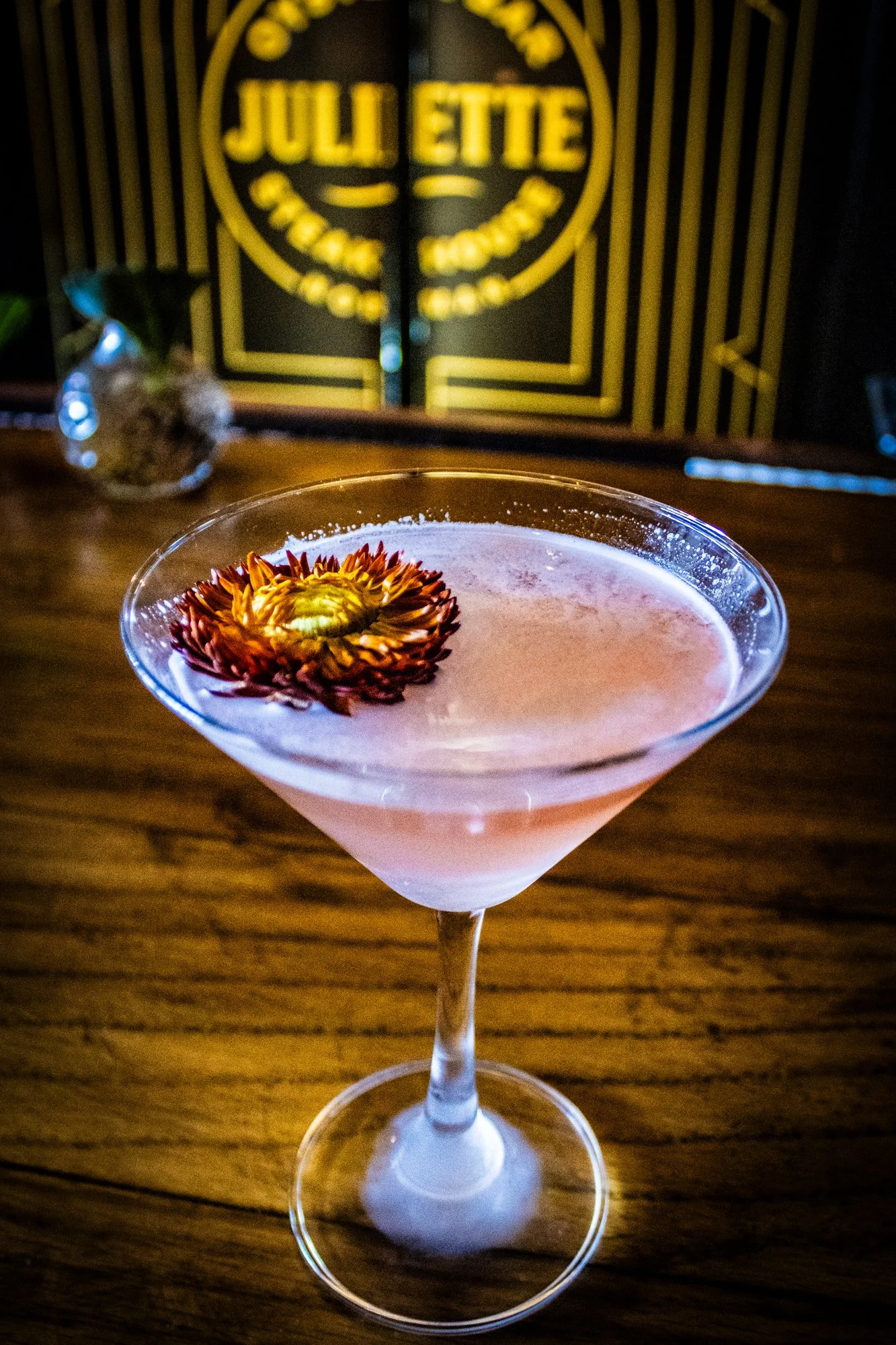 Photo of a oysters on a tray filled with rock salt and dressings 