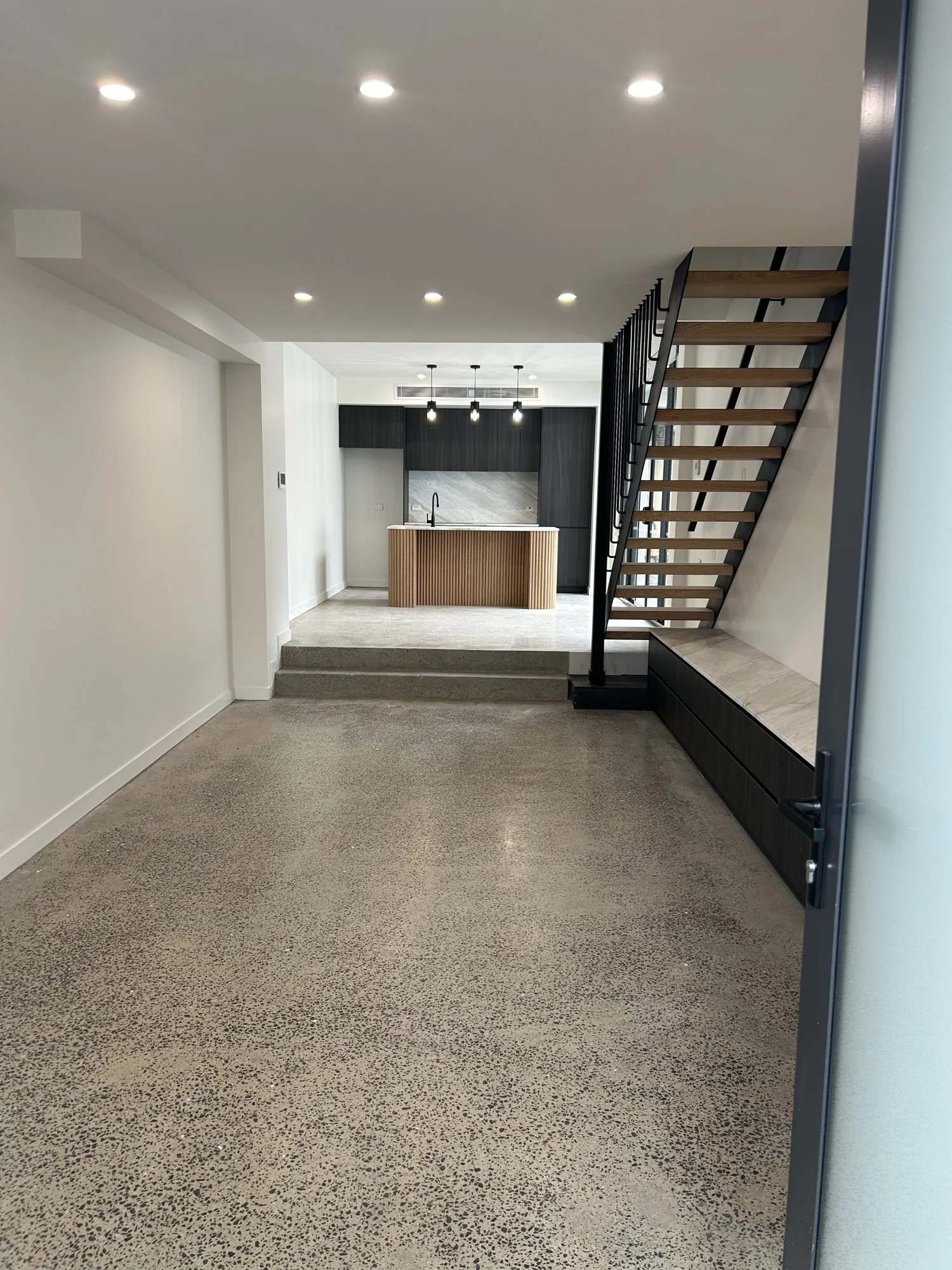 Living area and kitchen, Abbotsford Street, North Melbourne