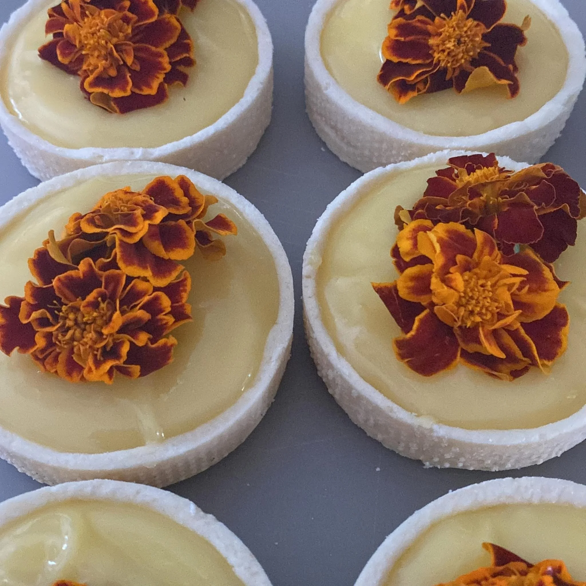 Lemon Tarts with Marigolds by Copper Country Sweets