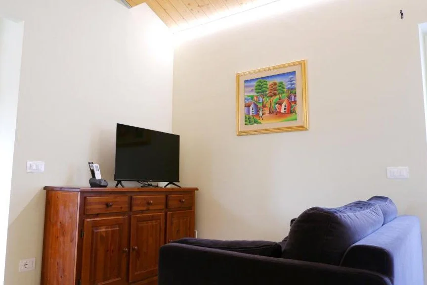 Soggiorno con angolo cucina - prima foto amatoriale B&B Porto San Giorgio, Marche