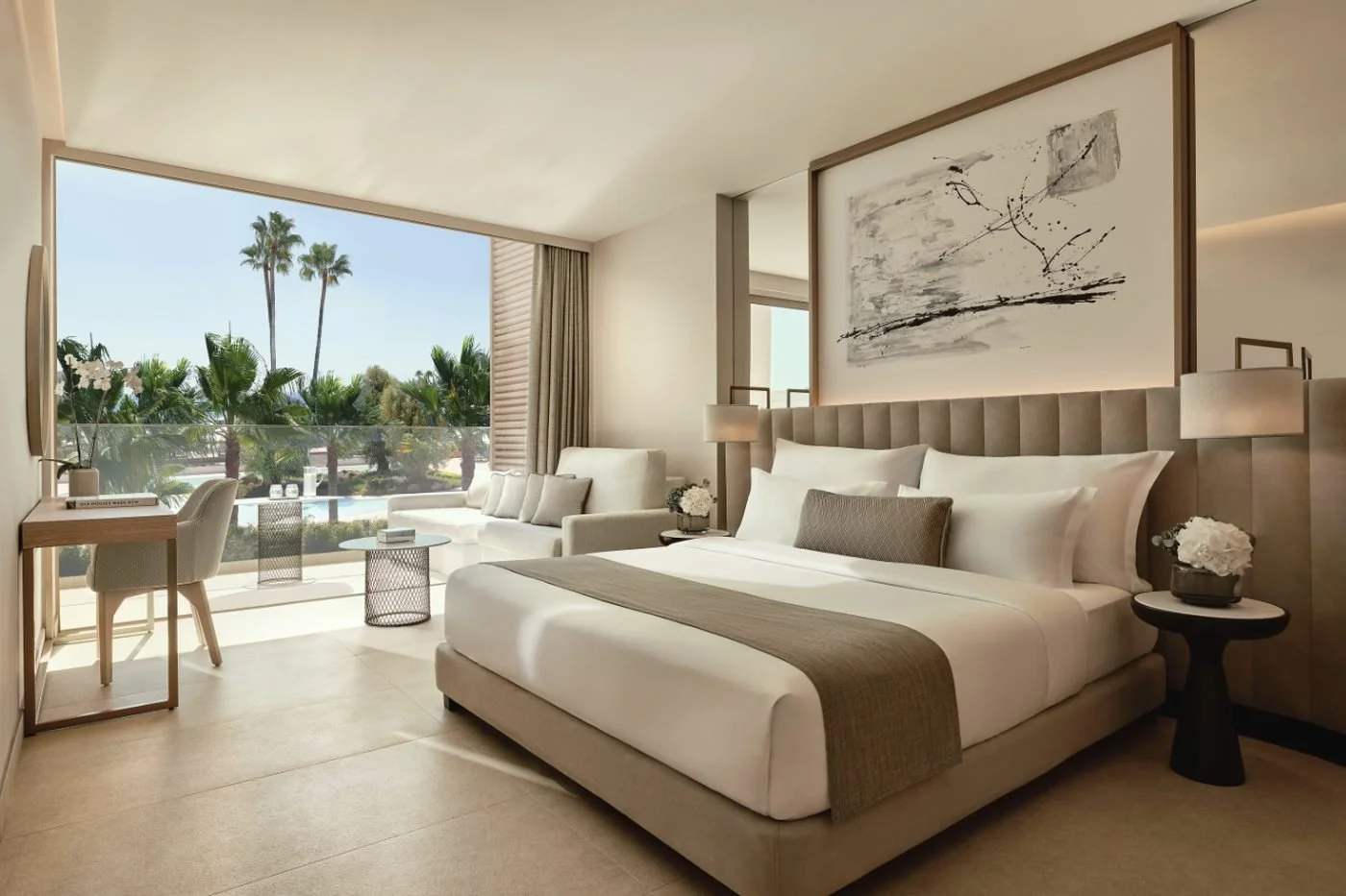 A Superior Double Room Pool View with a king-size bed and a balcony overlooking palm trees and a pool