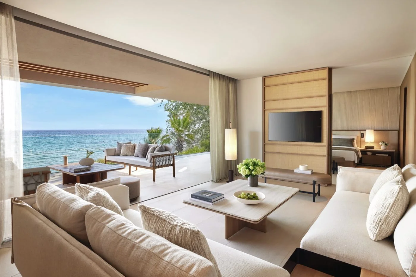 Living room of a grand residence at Sani Asterias opening onto a terrace above the sea