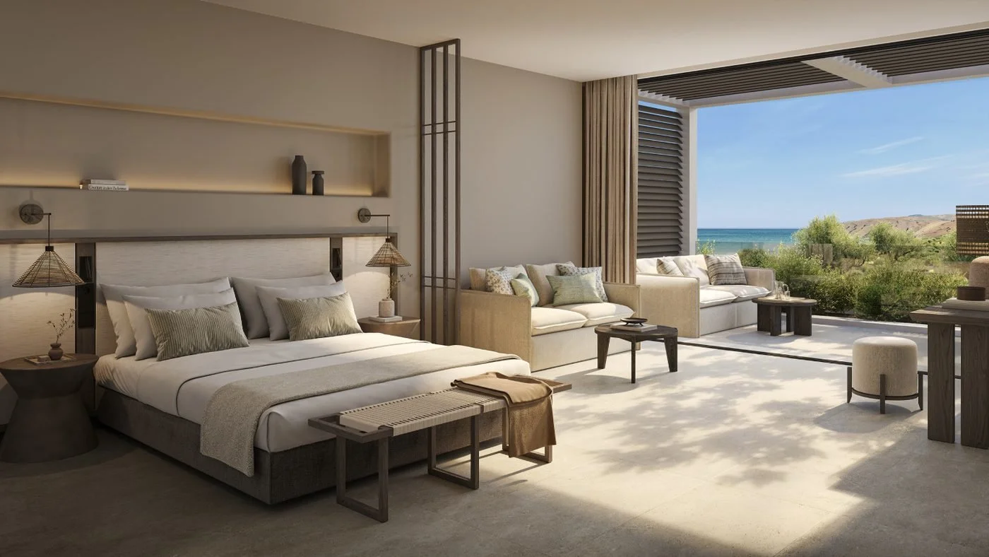 Artist's impression of a Deluxe Junior Suite with a bed and sitting area facing the sea