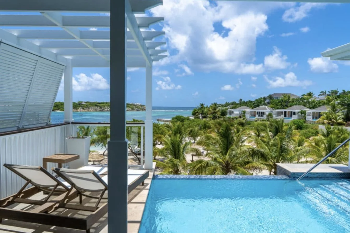 A Signature Villa terrace and pool over the resort and sea