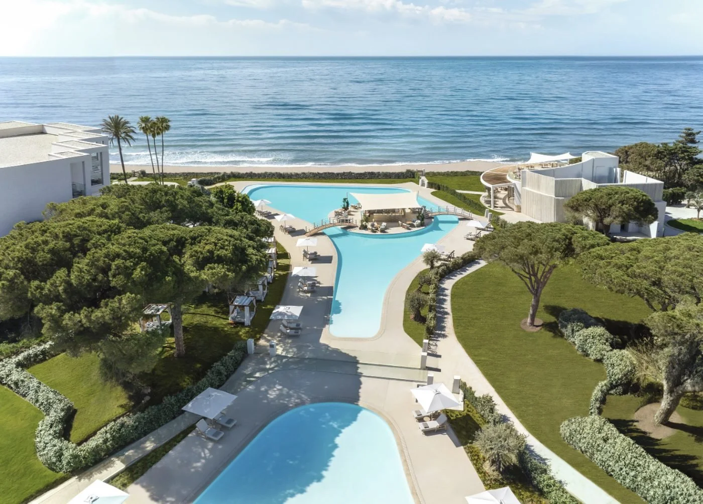 The Deluxe pool from above, running down to the beach