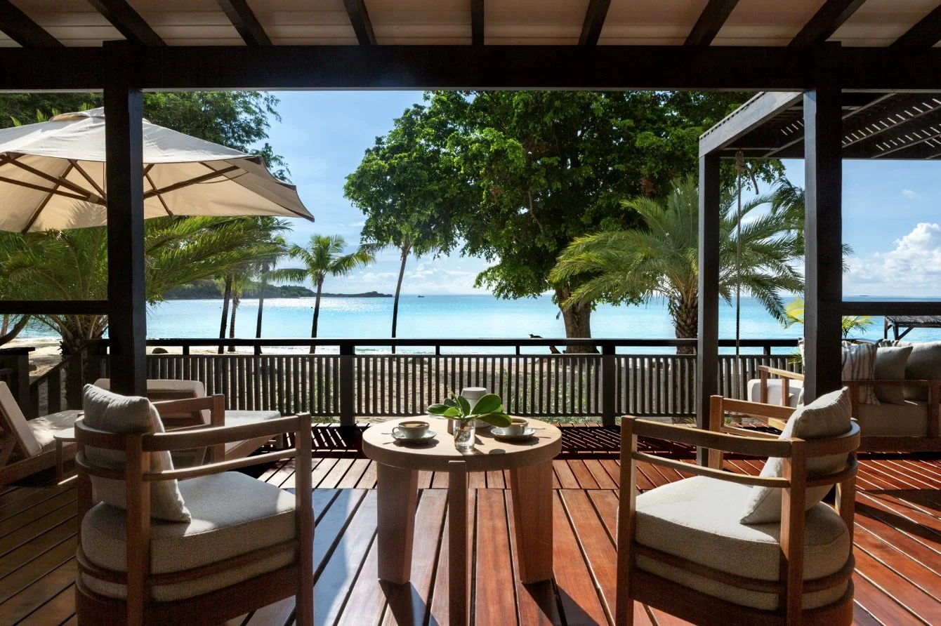 A beachfront villa deck looking out to the sea