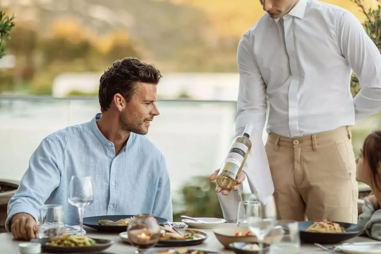 Wine service on a restaurant terrace