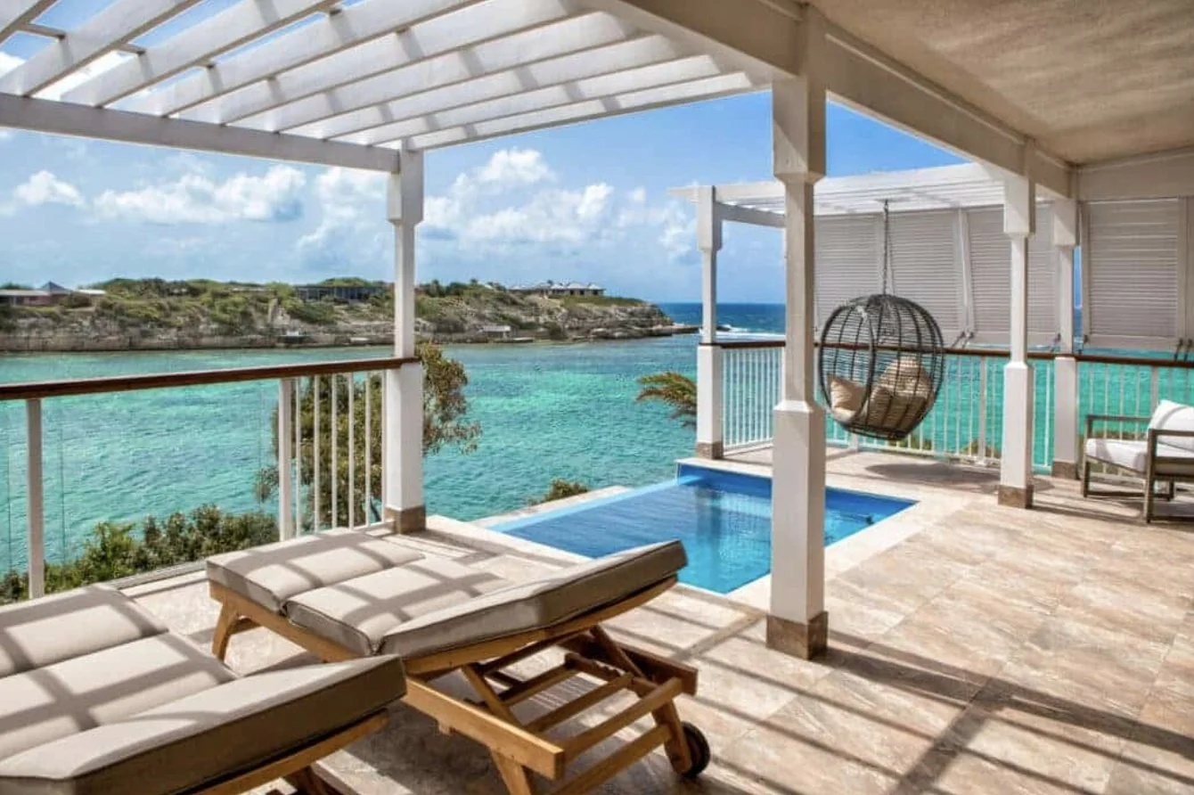 A Waterfront Villa terrace and plunge pool over the bay