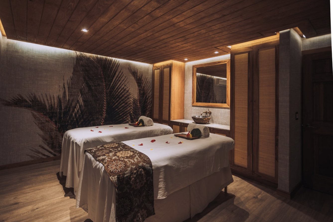 A candlelit couples treatment room
