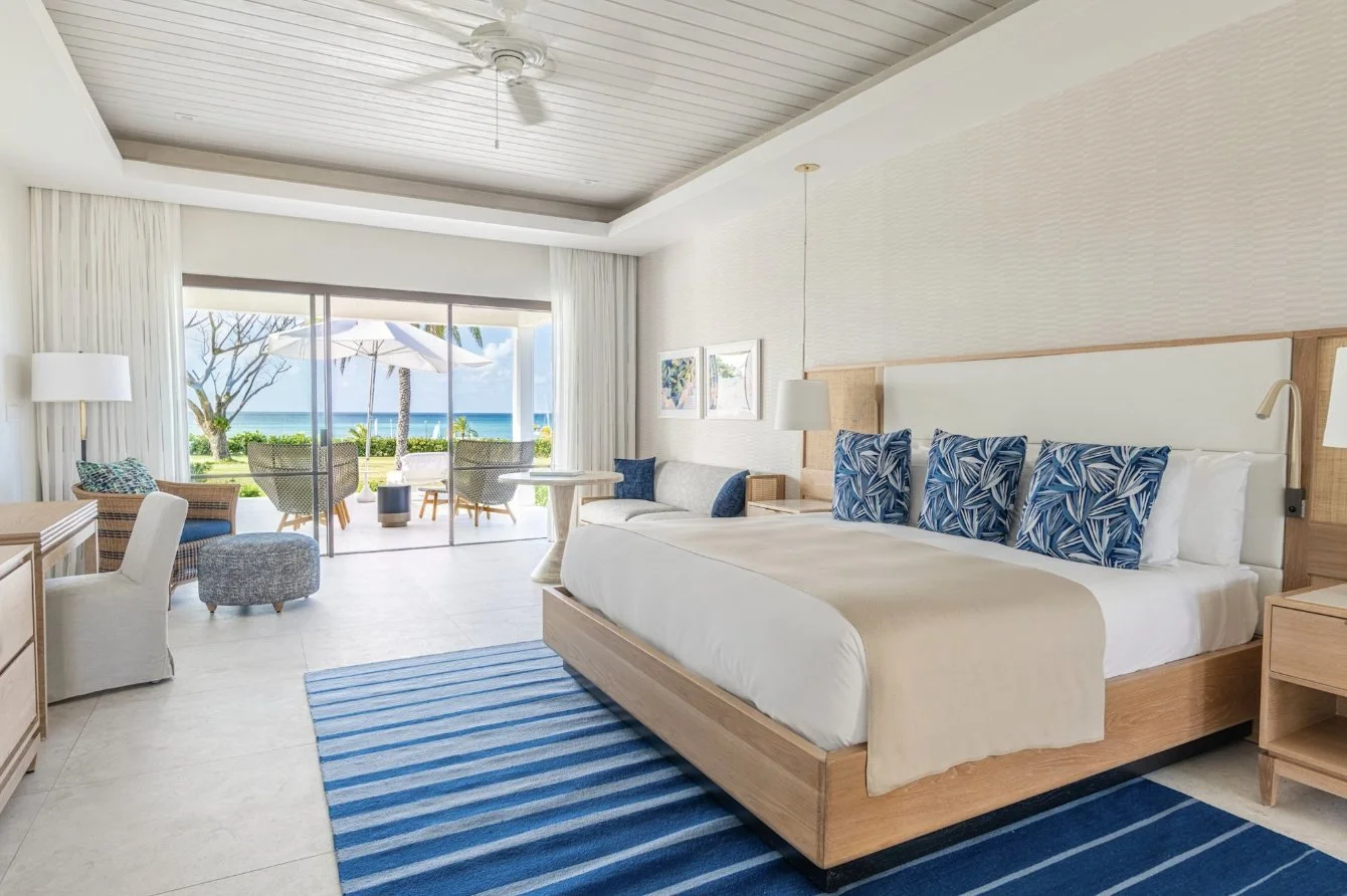A Garden Cottage bedroom with sea-view terrace