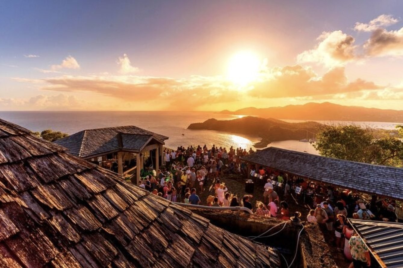 Crowds watching the sunset at Shirley Heights above English Harbour