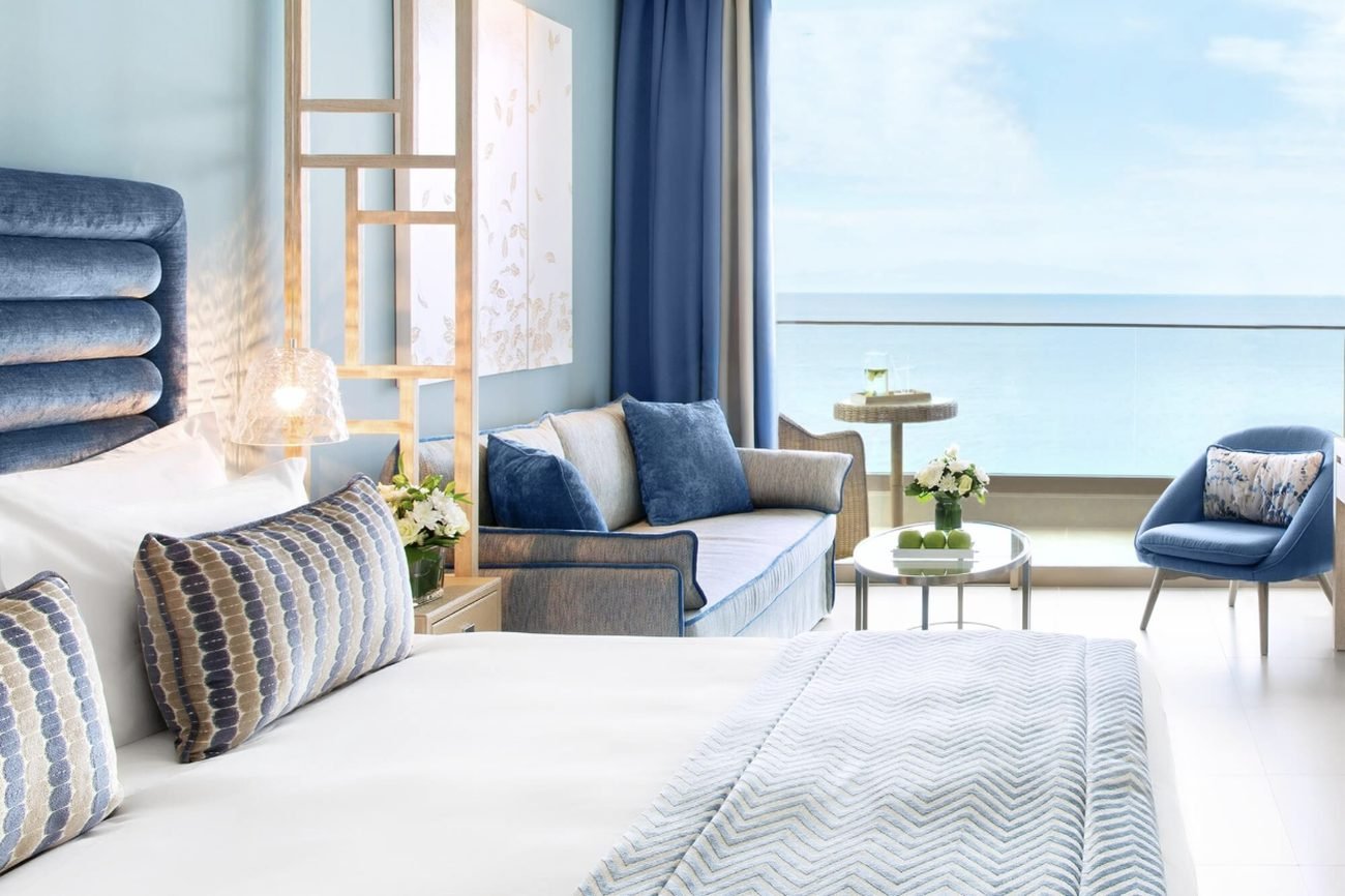 A blue and white suite facing the sea