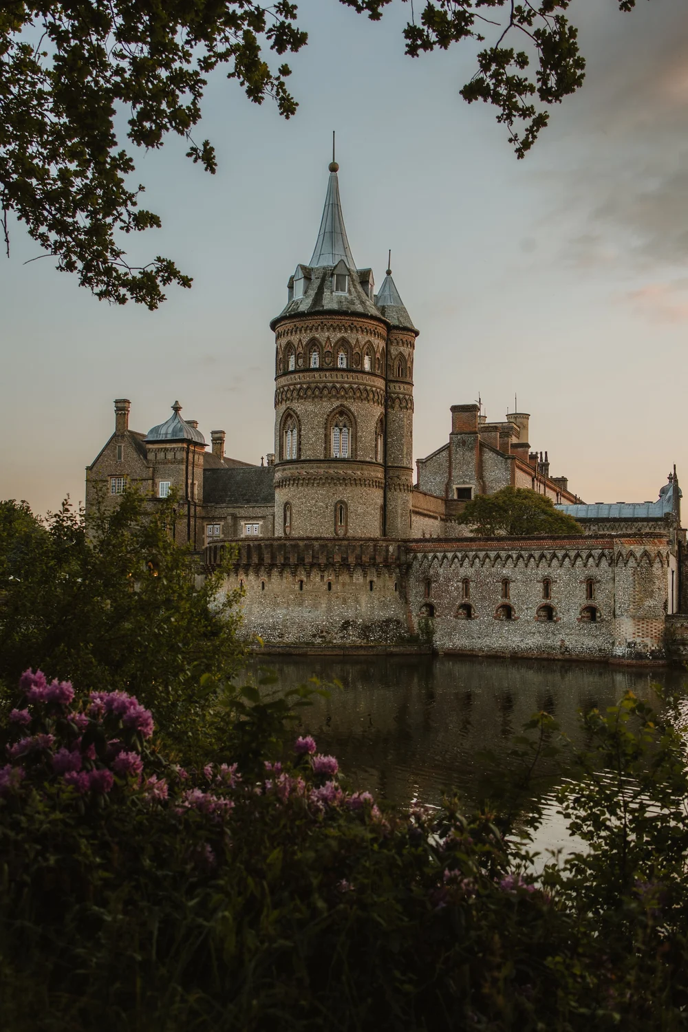A fairytale castle wedding venue under a blue sky