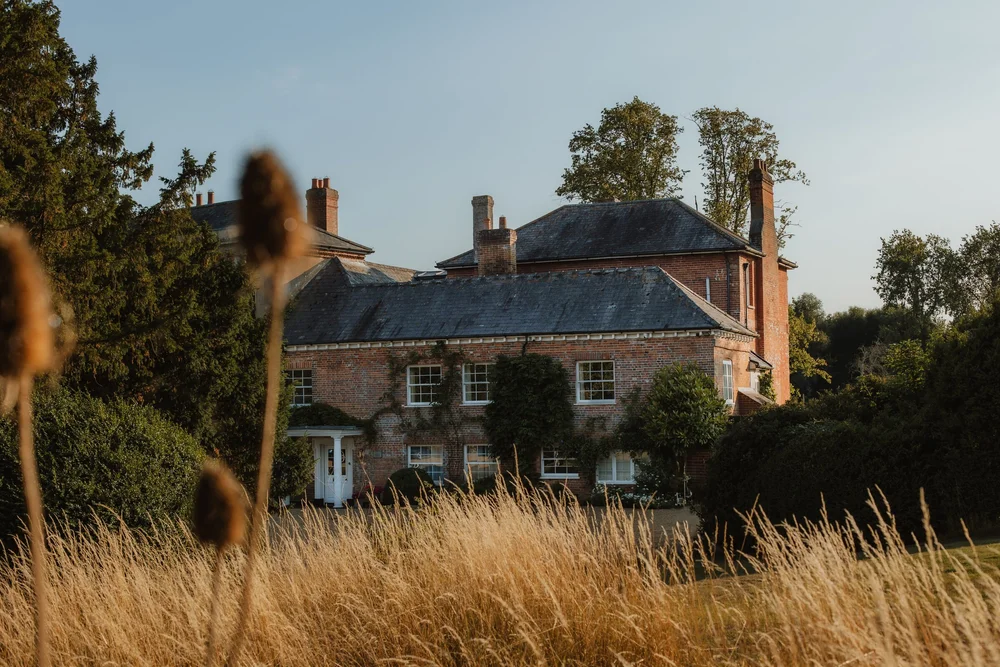 Wedding venue: a country house in golden evening light