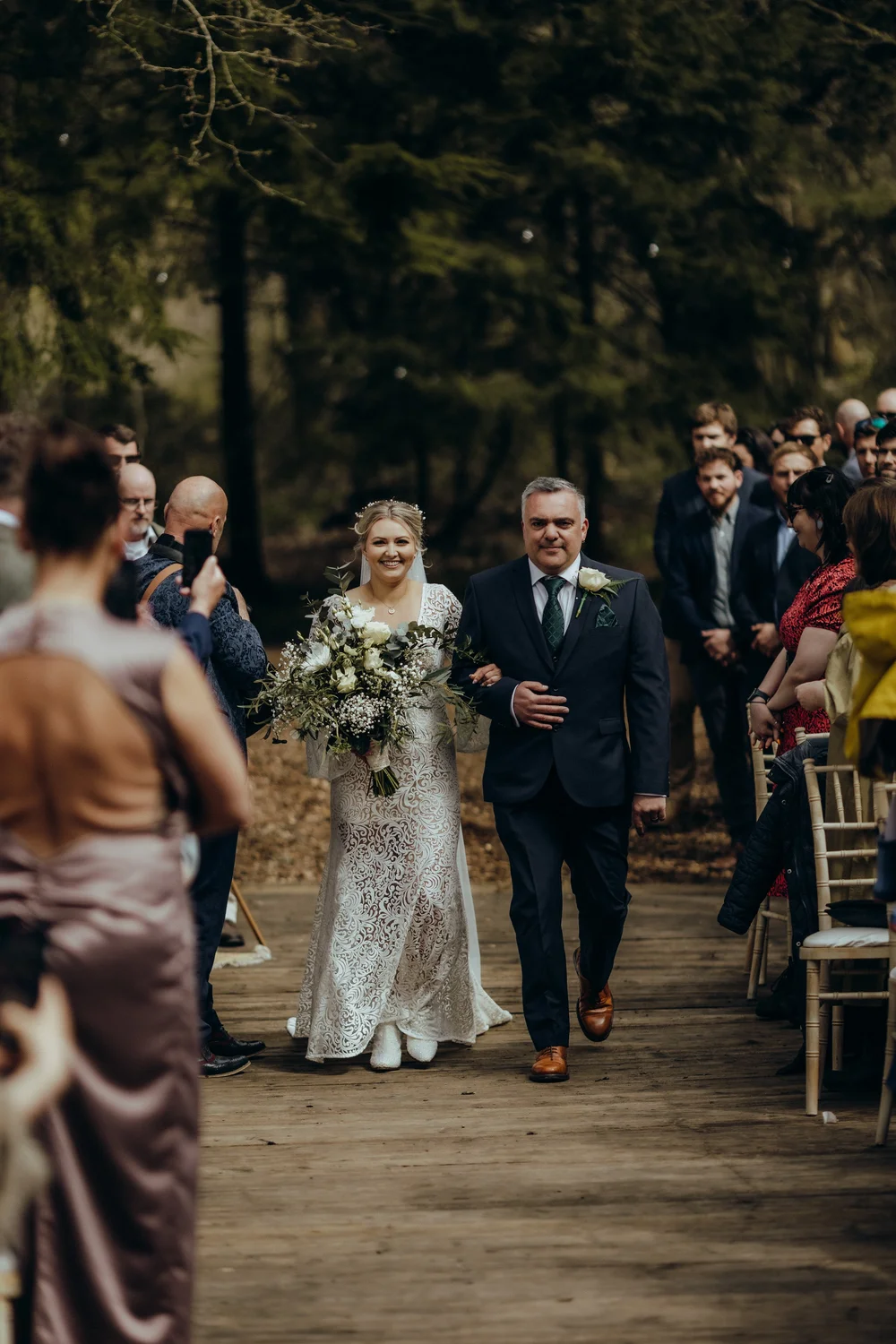 Bride walking down the aisle with her father