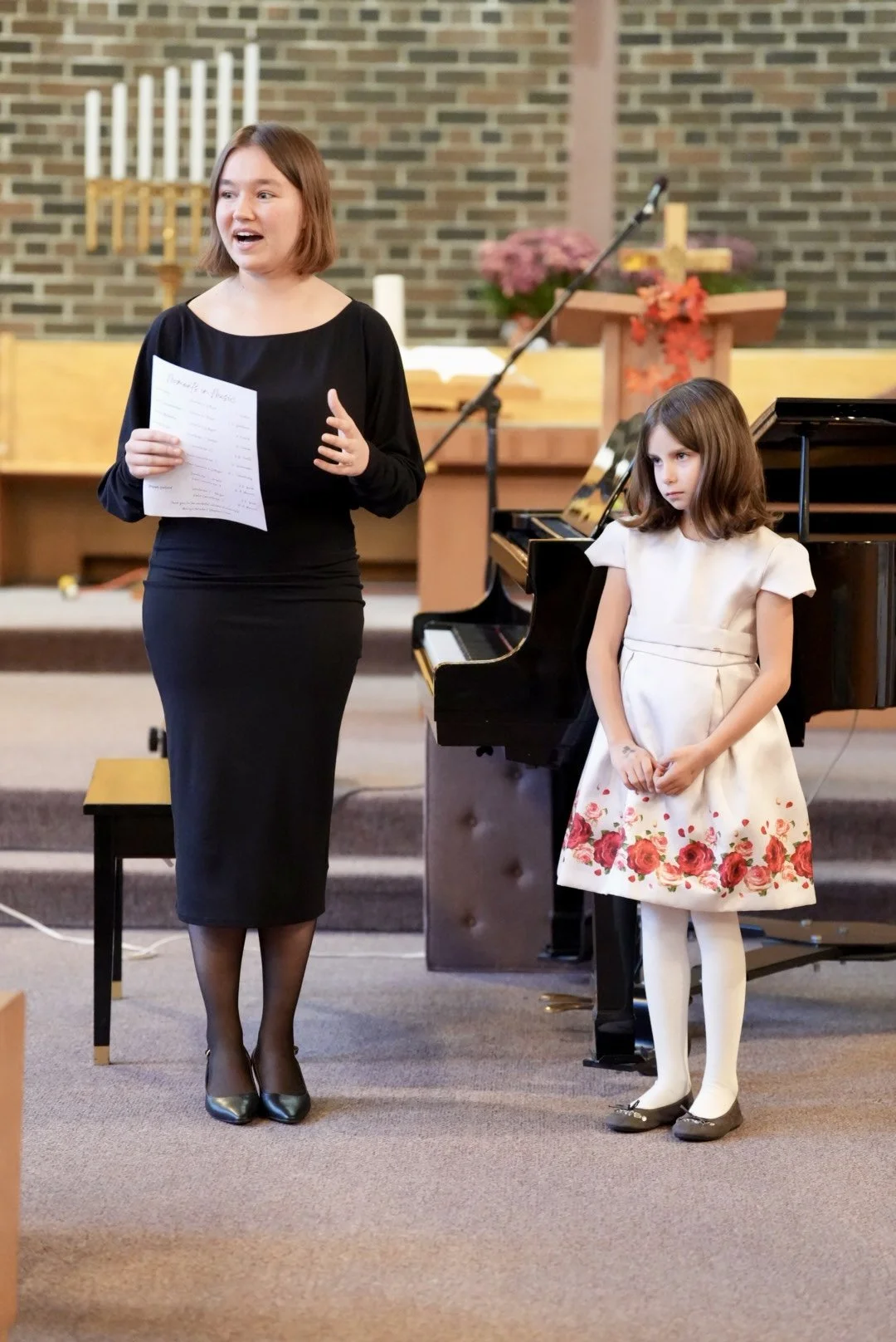 Host speaking at a studio event