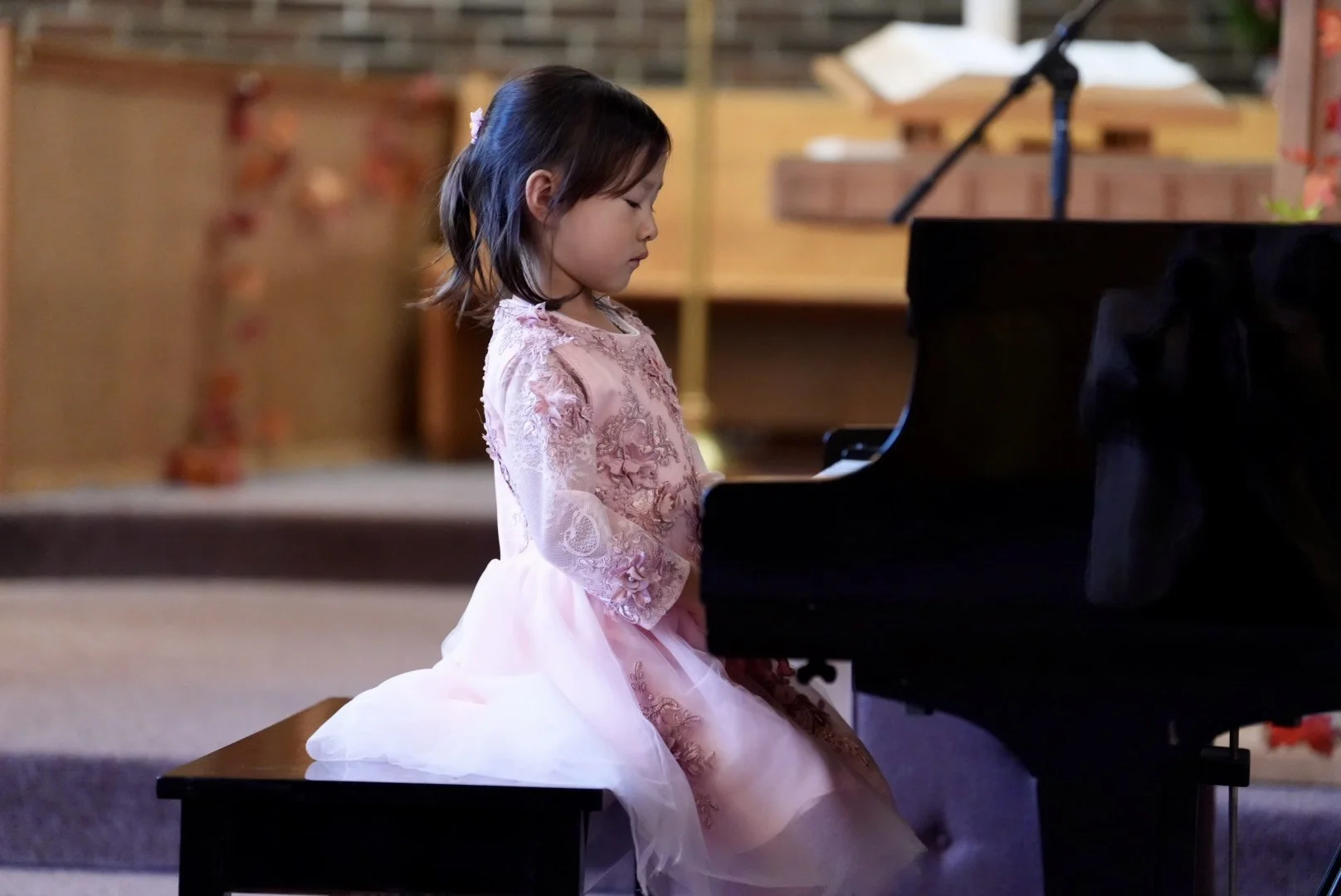 Student playing piano