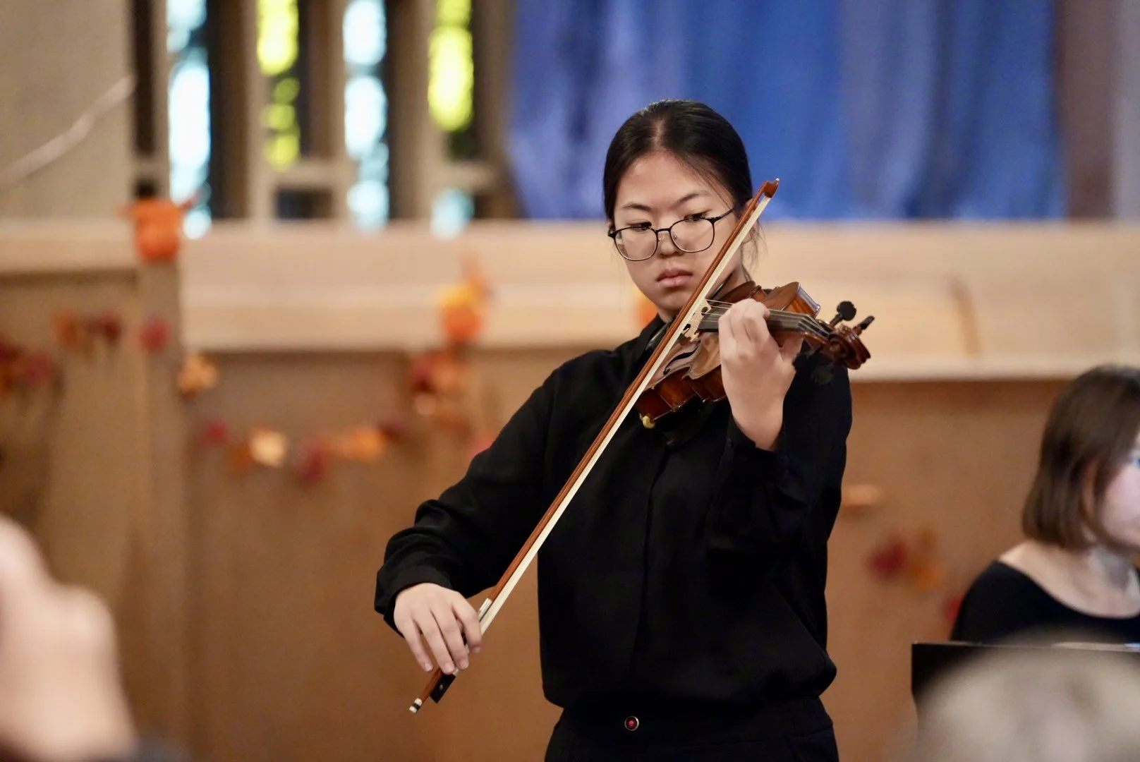 Close-up of a student playing violin