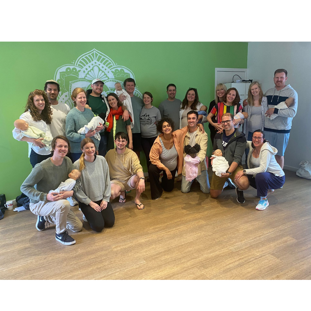 Group of parents attending a MAMA birth class together