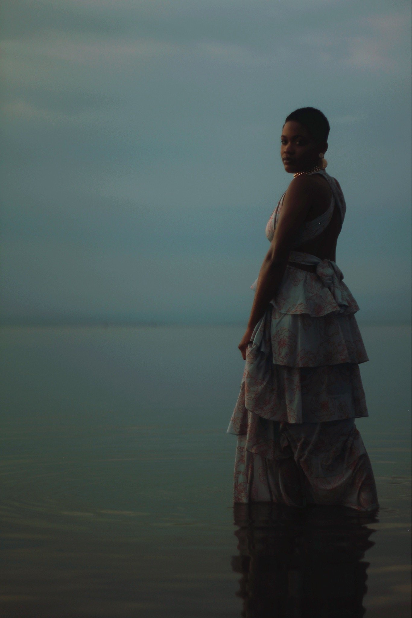 Black and white sunrise portrait with fabric and movement