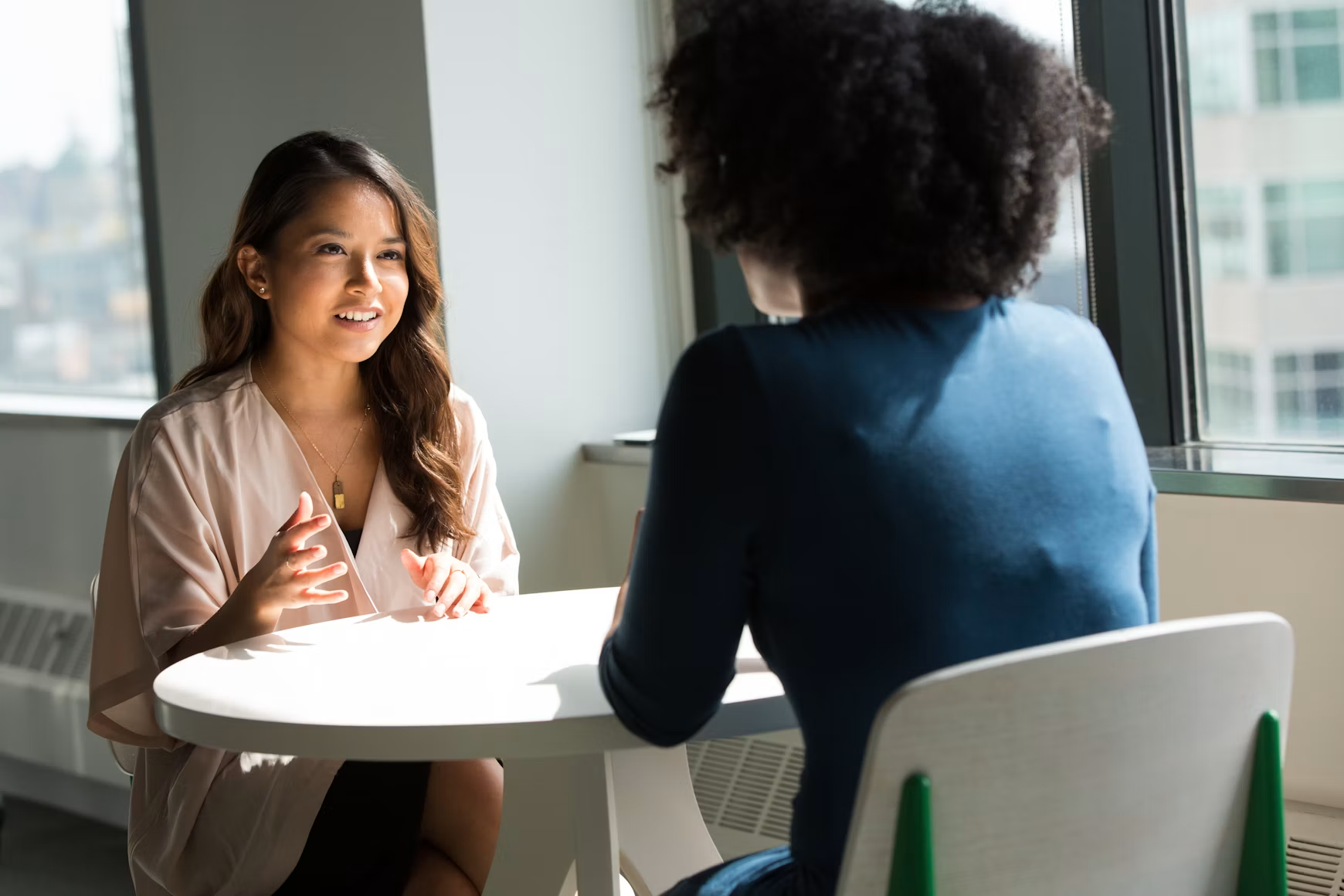 Two colleagues in conversation