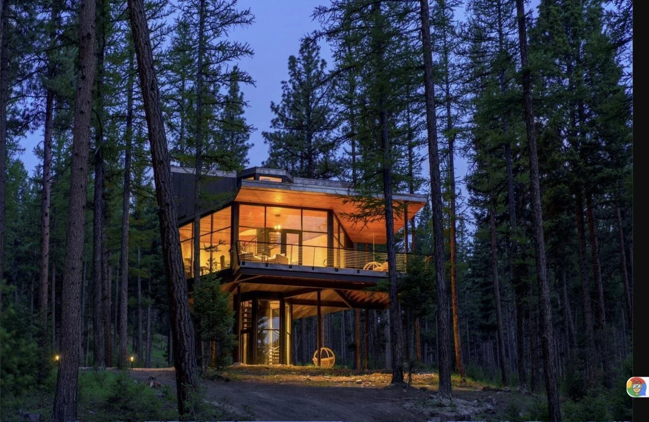 Elevated treehouse suite at Paws Up Montana among the pines