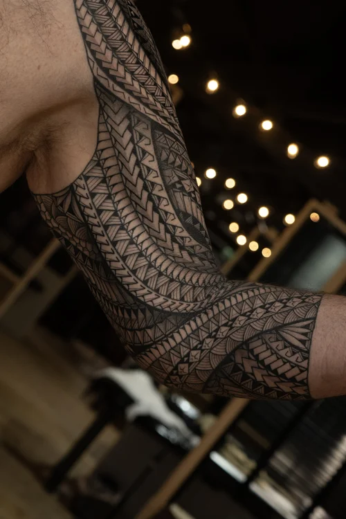 Polynesian sleeve tattoo by Mateusz at Skinzophrenic Tattoos Hereford