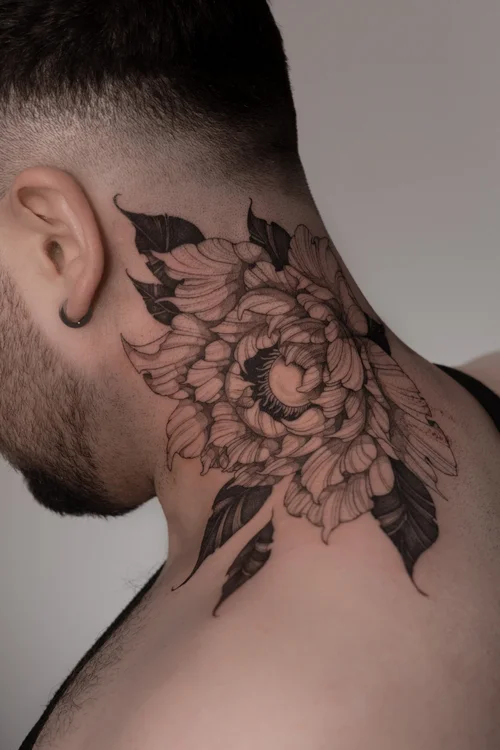 Neck peony tattoo by Mateusz Krygowski