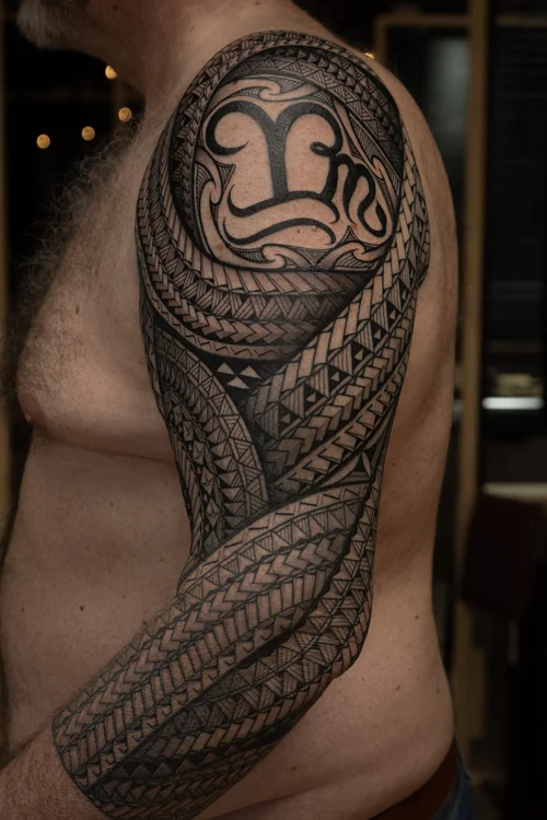 Polynesian sleeve tattoo by Mateusz Krygowski