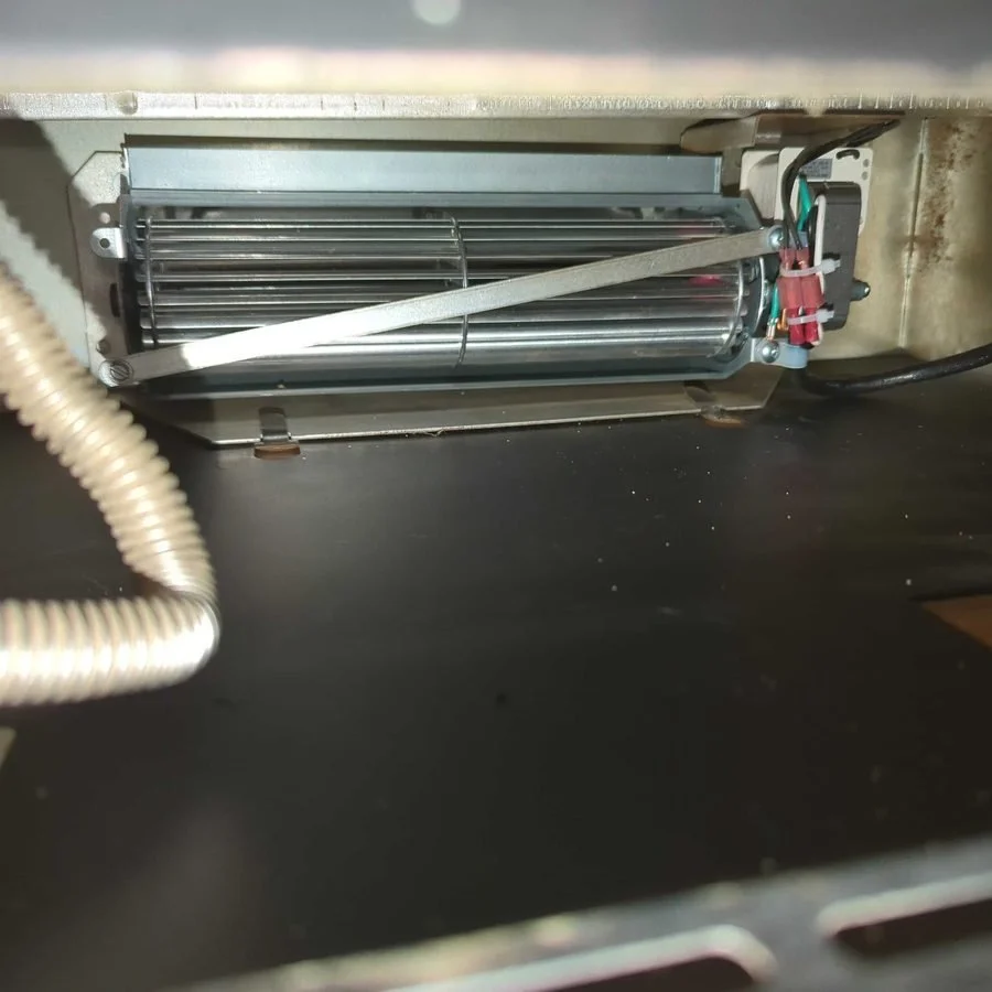 New blower fan installed in a gas fireplace