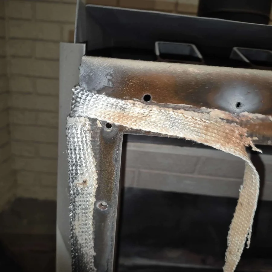 Worn gas fireplace door gasket