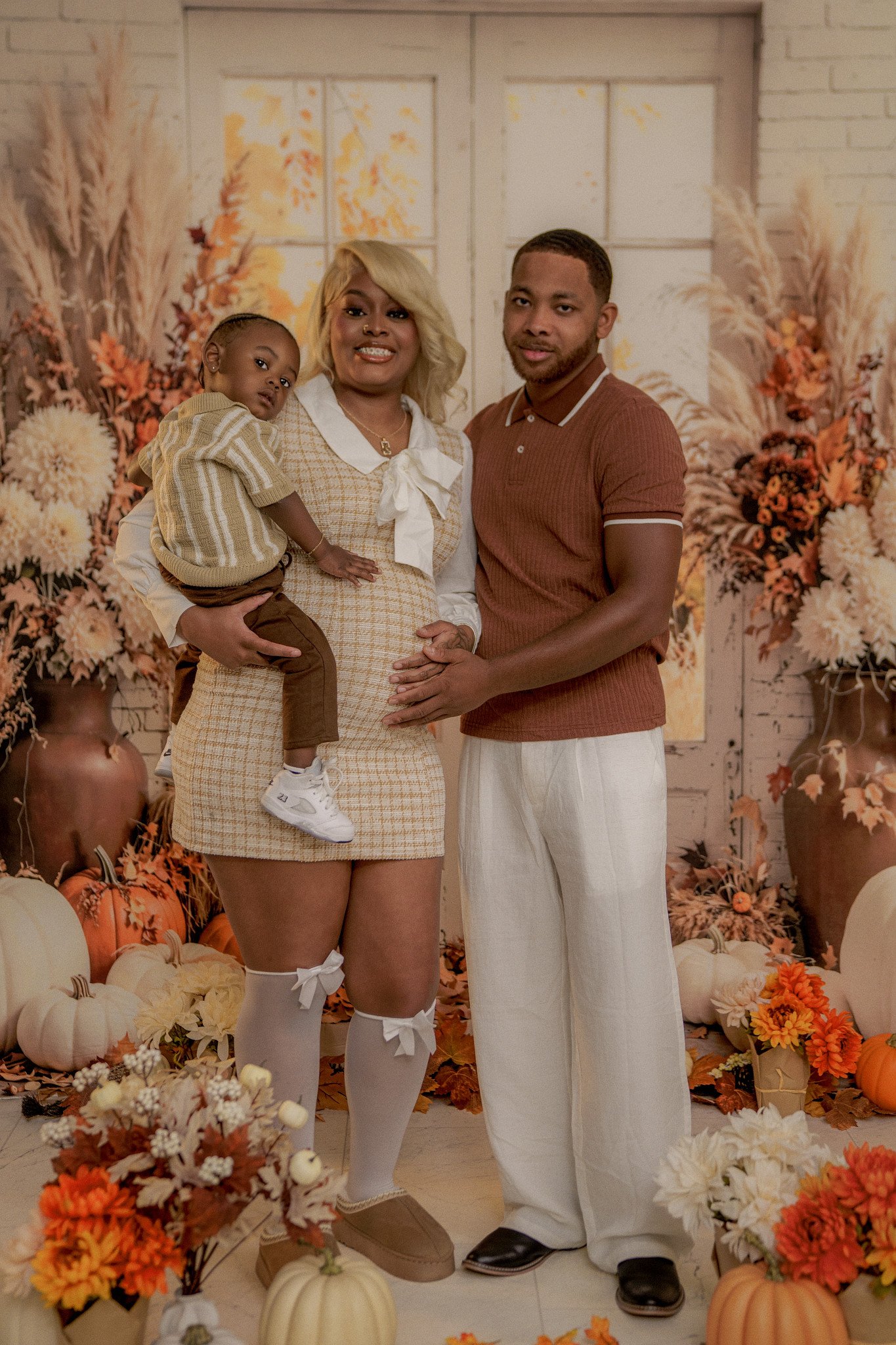 Couple at fall backdrop